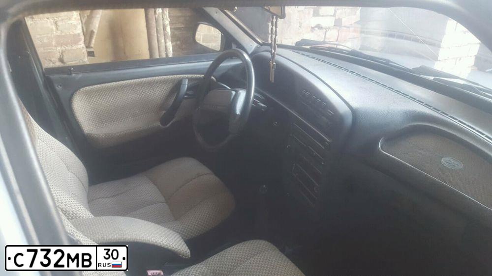 Фото автомобиля LADA 2115 SAMARA, 2007 — госномер С732МВ30. Цвет: Серебристо-желто-голубой