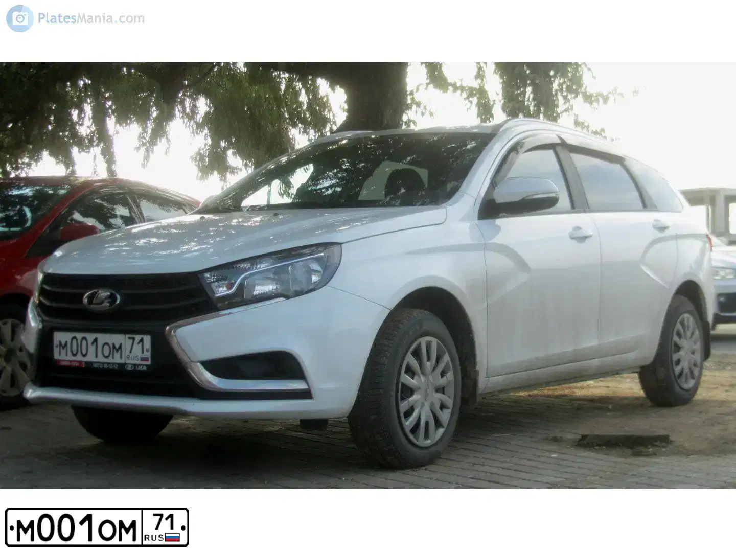 Фото автомобиля LADA VESTA, 2018 — госномер М001ОМ71. Цвет: БЕЛЫЙ
