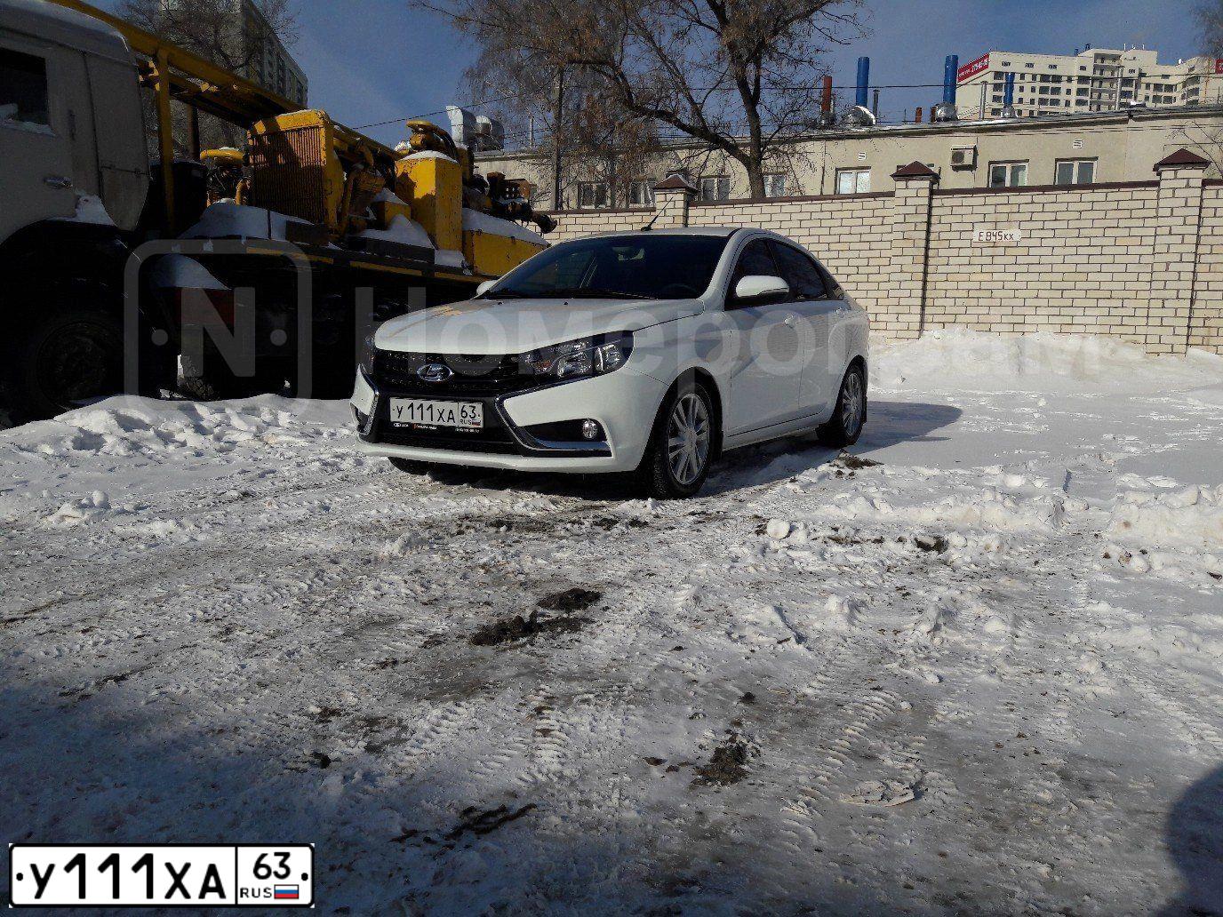Фото автомобиля LADA VESTA, 2016 — госномер Р606ХЕ73. Цвет: Белый