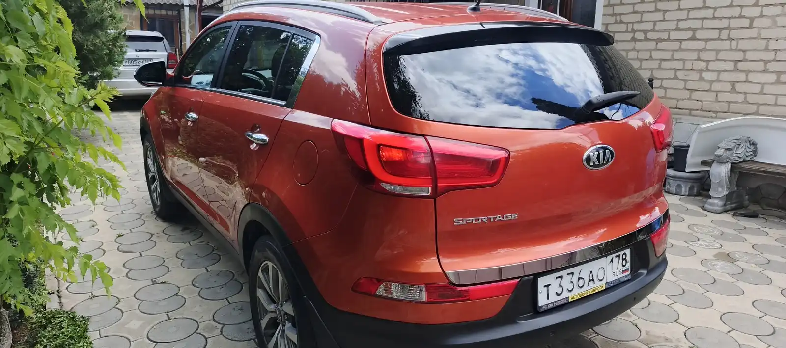 Фото автомобиля KIA SPORTAGE, 2014 — госномер Т336АО178. Цвет: Оранжевый