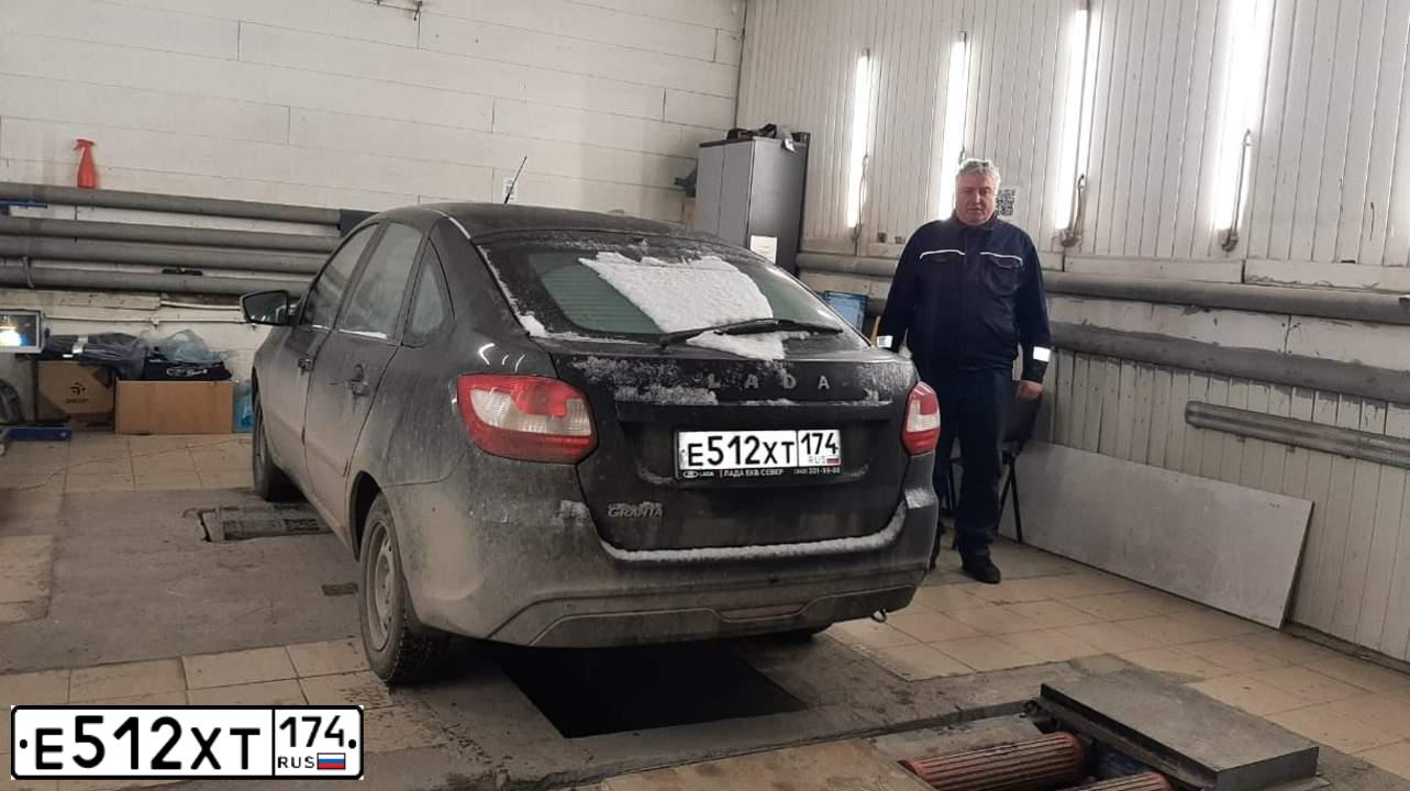Фото автомобиля LADA 2191 GRANTA, 2018 — госномер Е512ХТ174. Цвет: ЧЕРНЫЙ