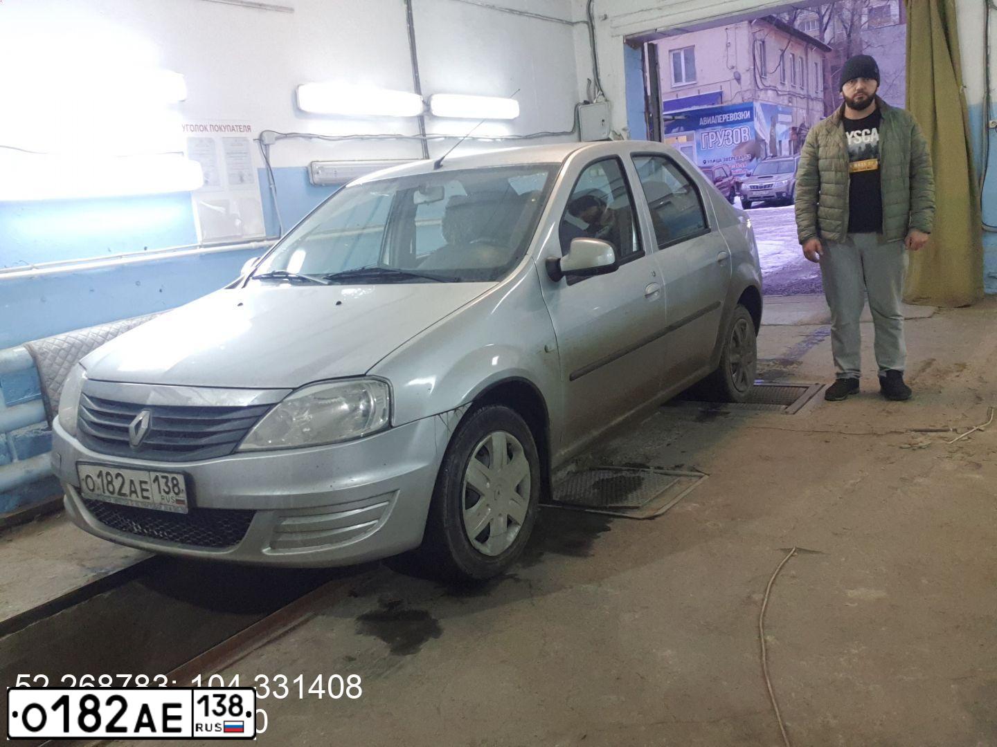 Фото автомобиля RENAULT LOGAN, 2013 — госномер О182АЕ138. Цвет: СВЕТЛО-СЕРЫЙ