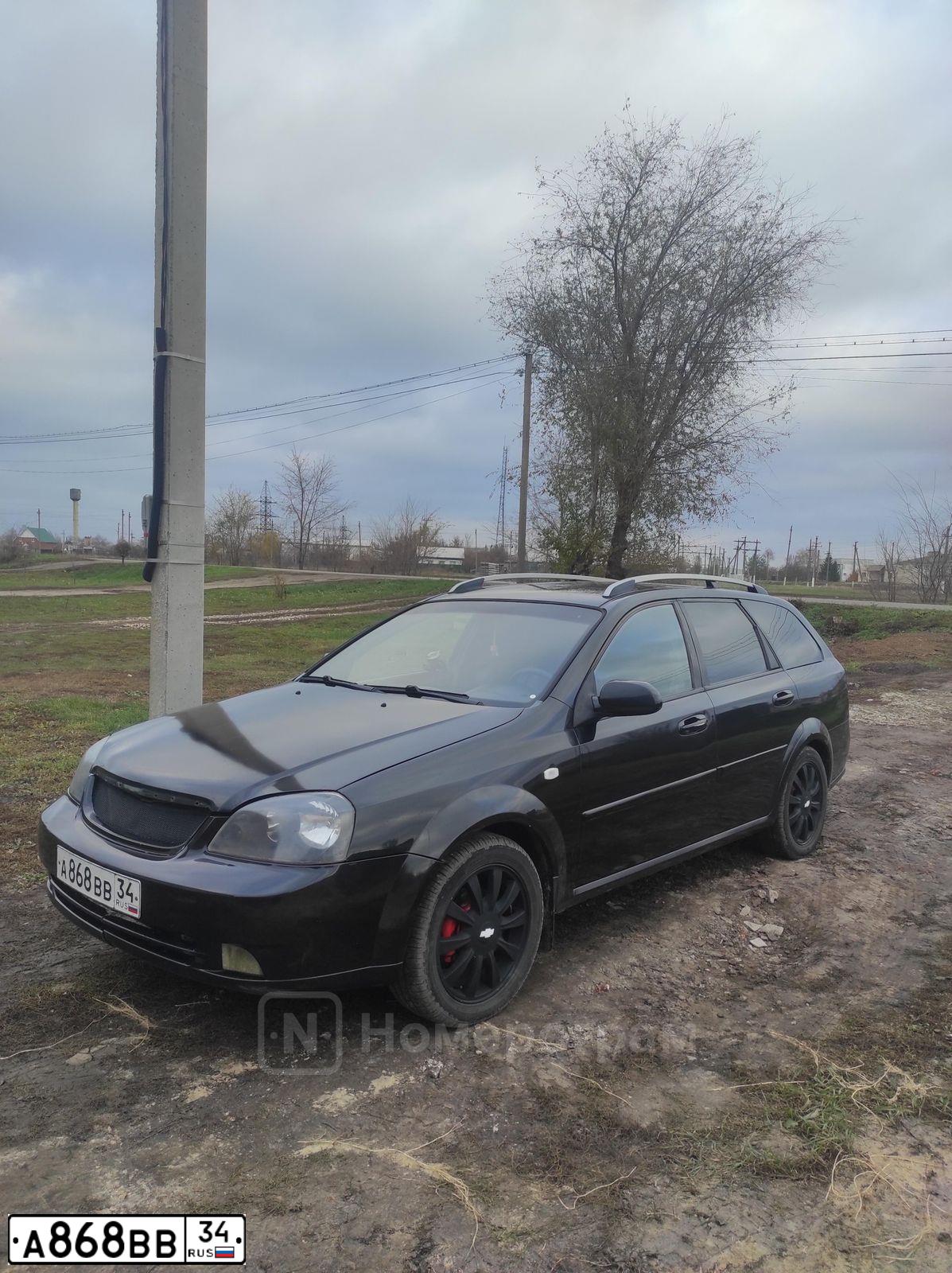 Фото автомобиля CHEVROLET LACETTI, 2008 — госномер А868ВВ34. Цвет: ЧЕРНЫЙ