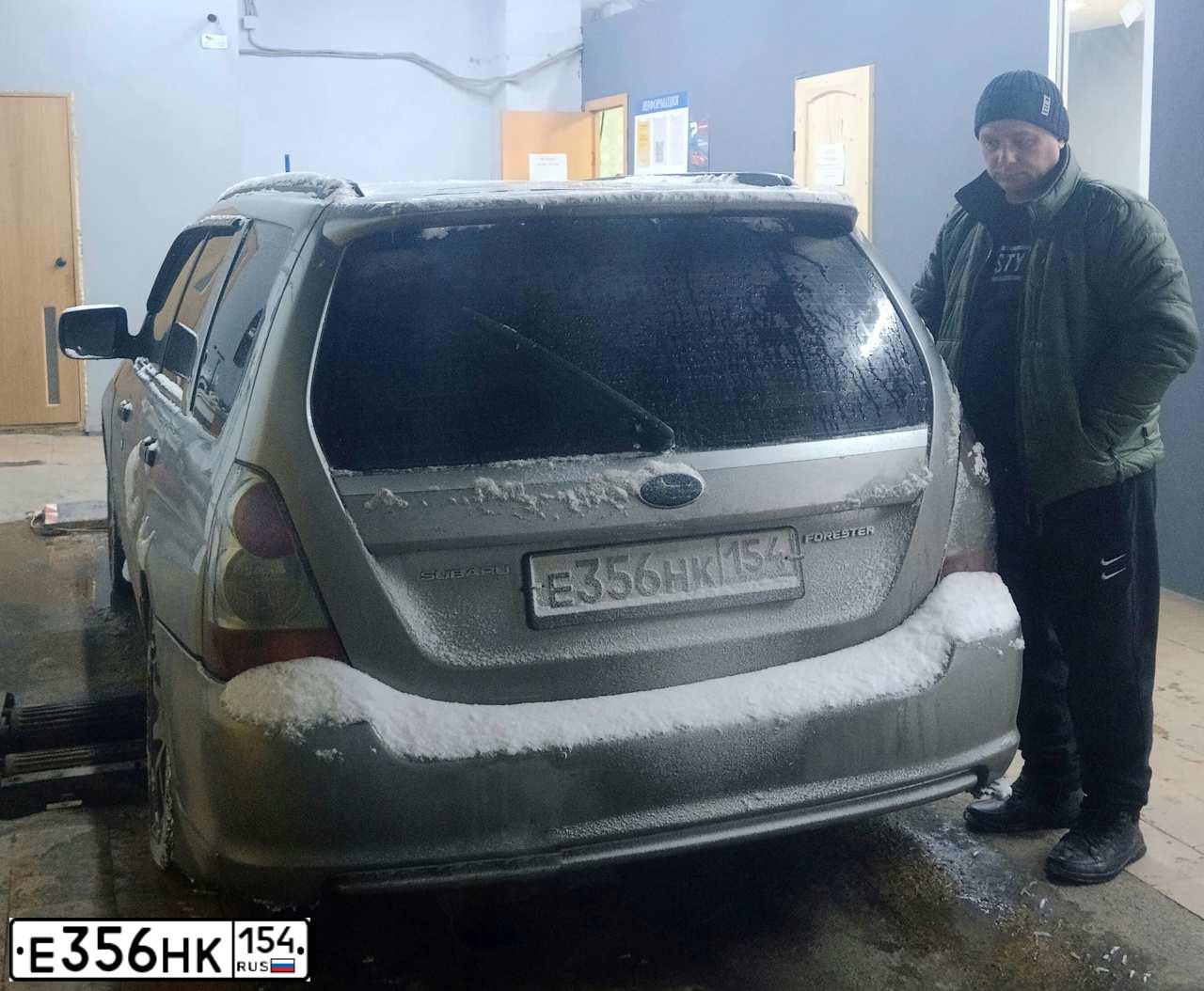 Фото автомобиля SUBARU FORESTER, 2006 — госномер В286ХТ199. Цвет: СЕРЫЙ