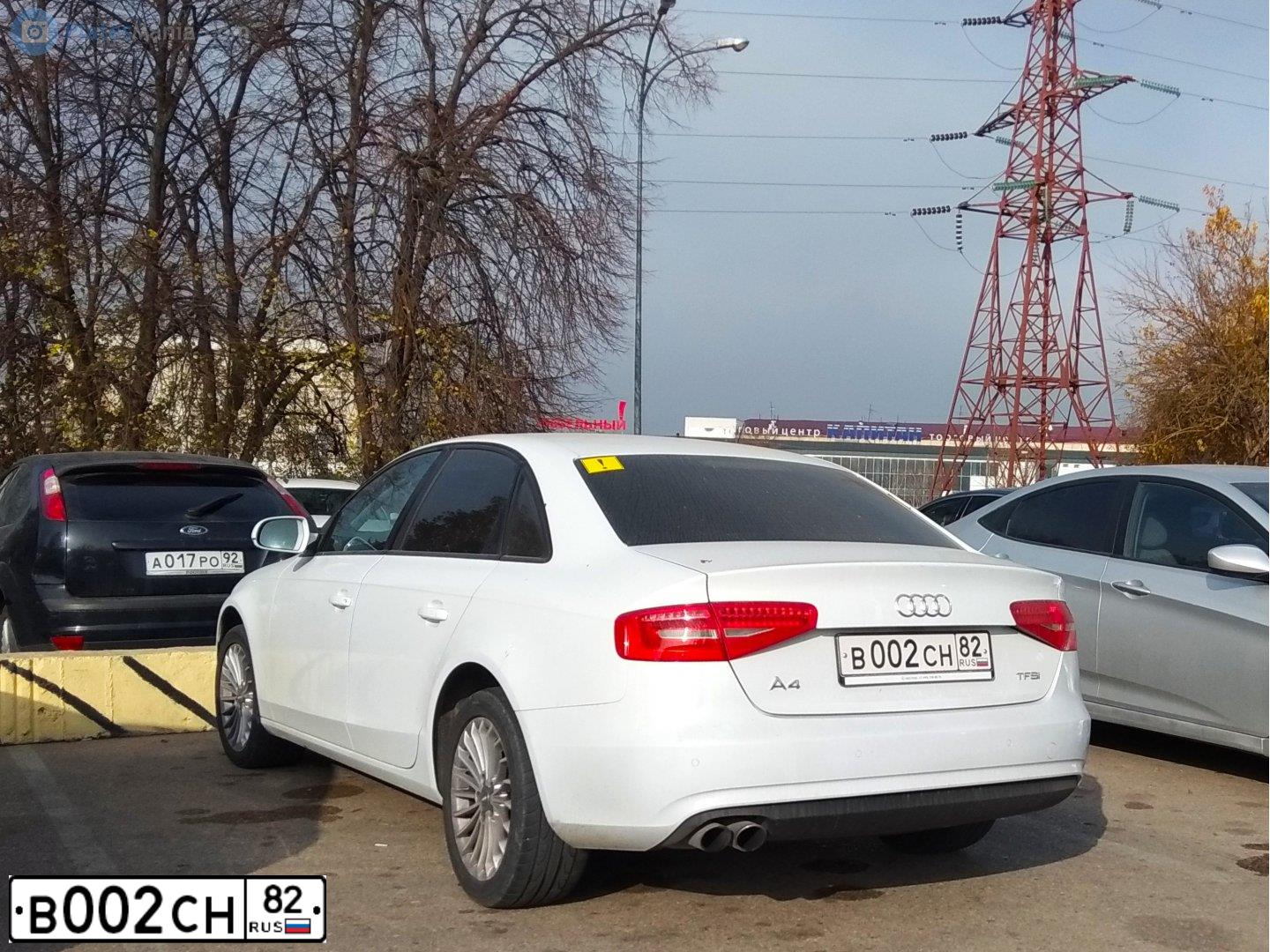 Фото автомобиля TOYOTA CAMRY, 2015 — госномер Е002СН82. Цвет: ЧЕРНЫЙ