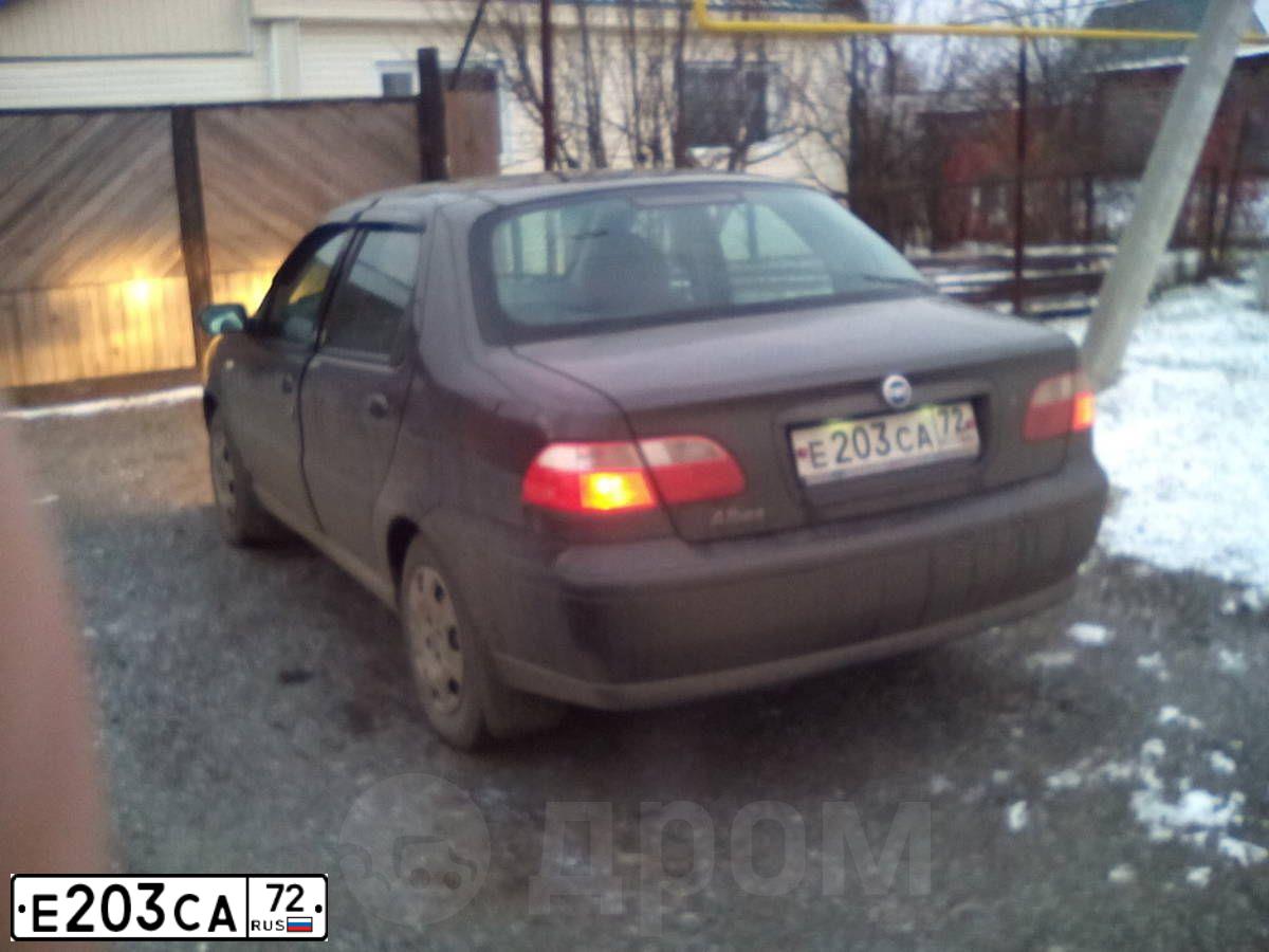Фото автомобиля FIAT ALBEA, 2007 — госномер Е203СА72. Цвет: СЕРЫЙ