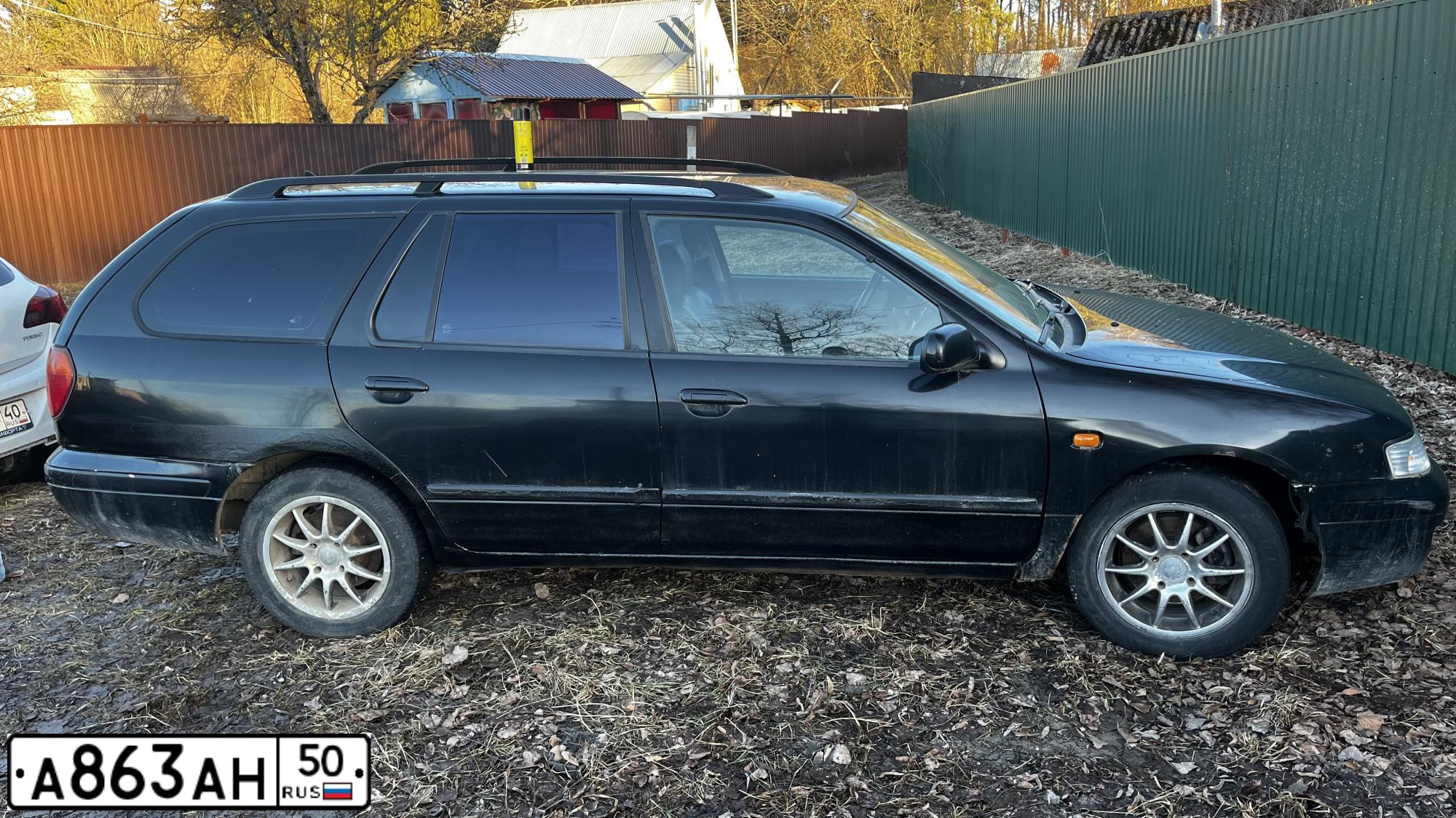 Фото автомобиля NISSAN PRIMERA, 1998 — госномер Р787ОТ40. Цвет: ЧЕРНЫЙ