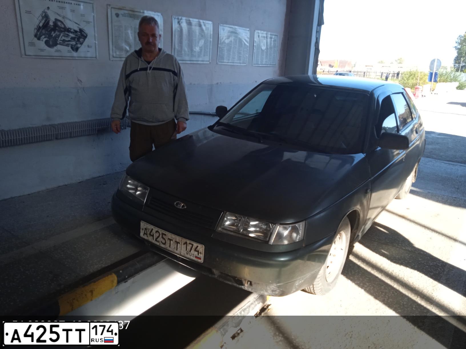 Фото автомобиля LADA 2112, 2008 — госномер Е258КМ774. Цвет: СЕРО-СИНЕ-ЗЕЛЕНЫЙ