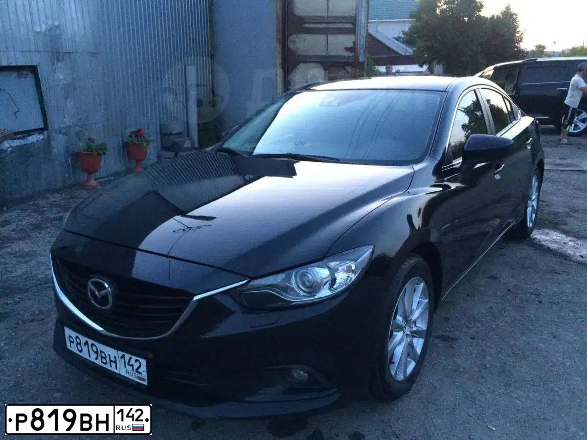 Фото автомобиля MAZDA 6, 2013 — госномер О229ВК138. Цвет: ЧЕРНЫЙ