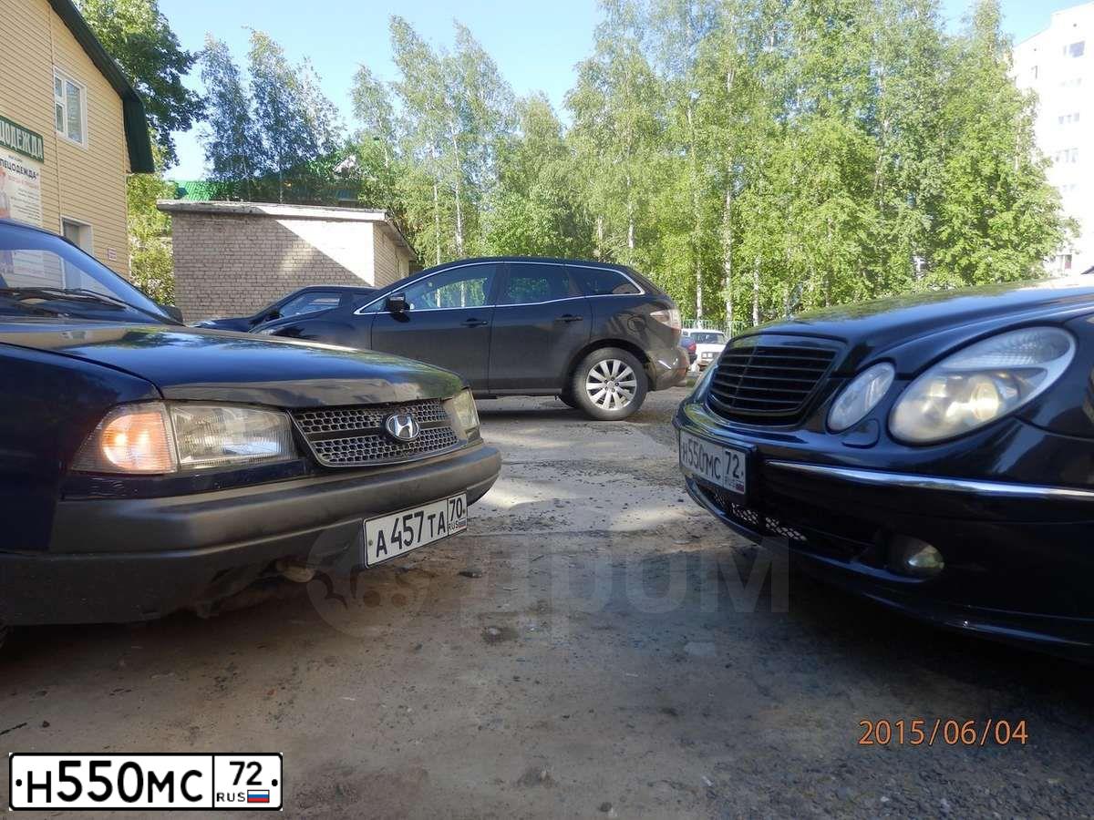 Фото автомобиля MERCEDES E-KLASSE, 2005 — госномер Н550МС72. Цвет: ЧЕРНЫЙ