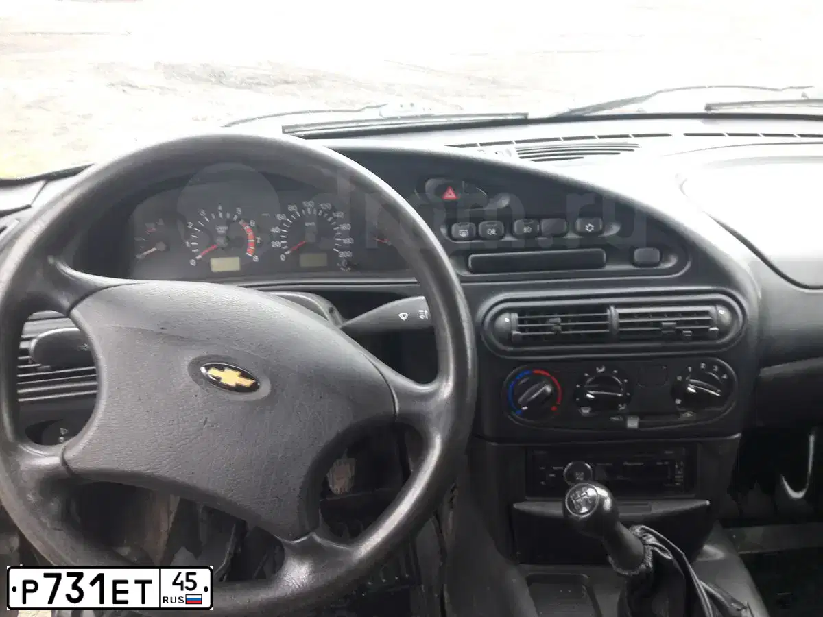 Фото автомобиля CHEVROLET NIVA, 2008 — госномер Р731ЕТ45. Цвет: Черно-синий металлик