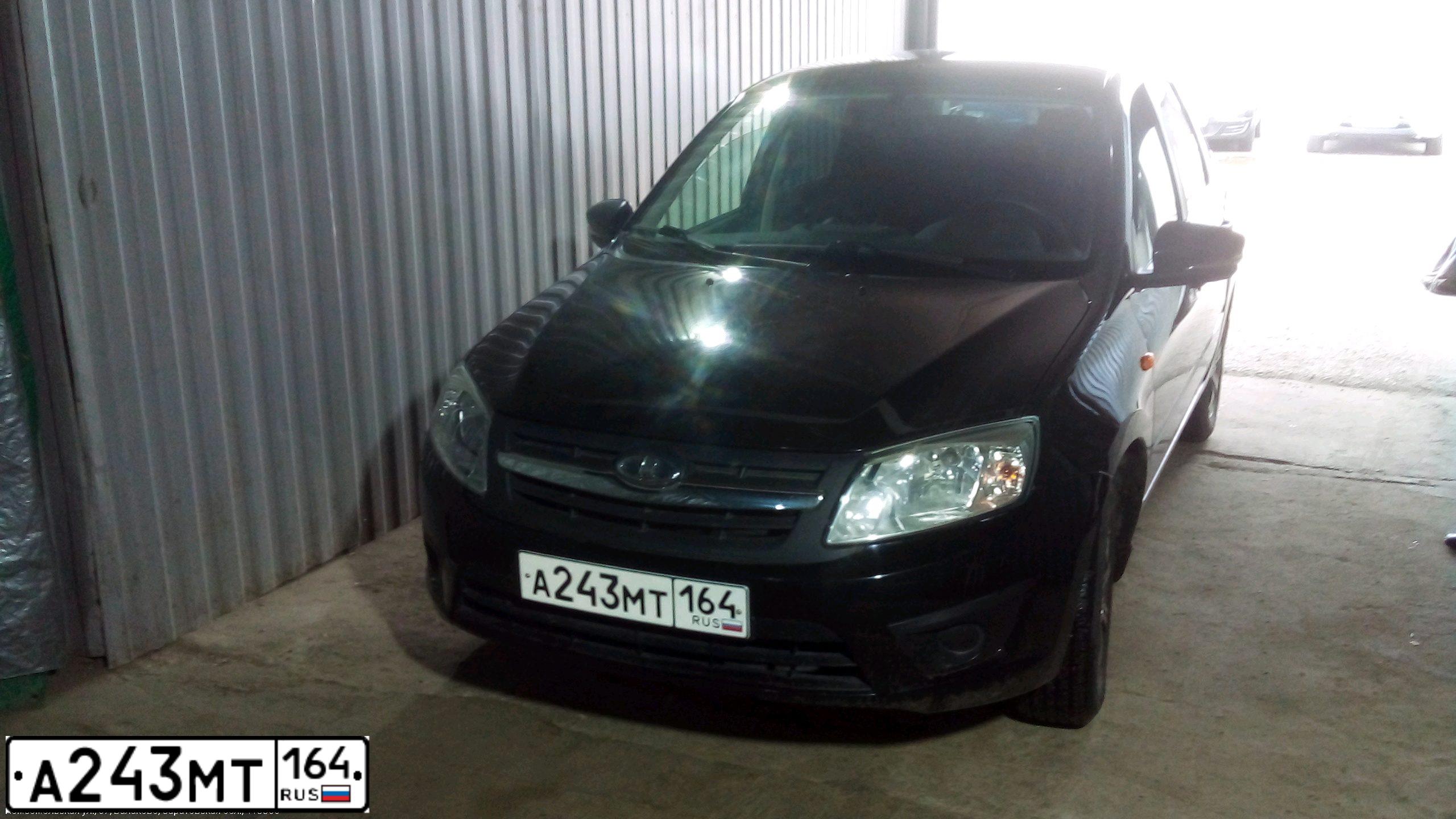 Фото автомобиля LADA 2190 GRANTA, 2016 — госномер А243МТ164. Цвет: ЧЕРНЫЙ