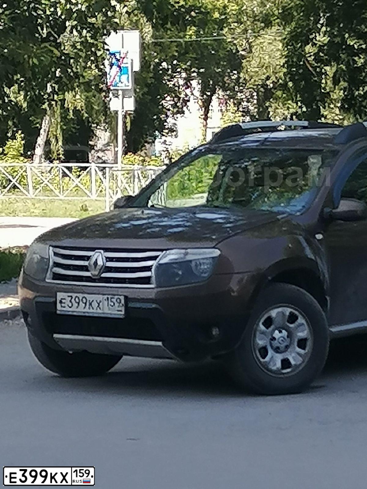 Фото автомобиля RENAULT DUSTER, 2014 — госномер Е399КХ159. Цвет: КОРИЧНЕВЫЙ