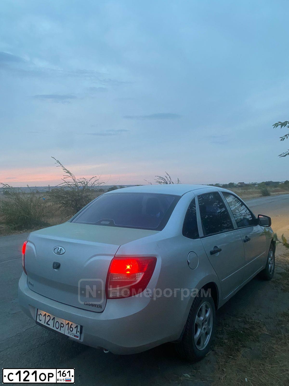 Фото автомобиля LADA 2190 GRANTA, 2012 — госномер С121ОР161. Цвет: БЕЛЫЙ