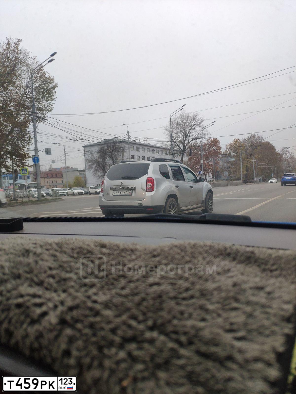Фото автомобиля RENAULT DUSTER, 2014 — госномер Т459РК123. Цвет: СВЕТЛО-СЕРЫЙ