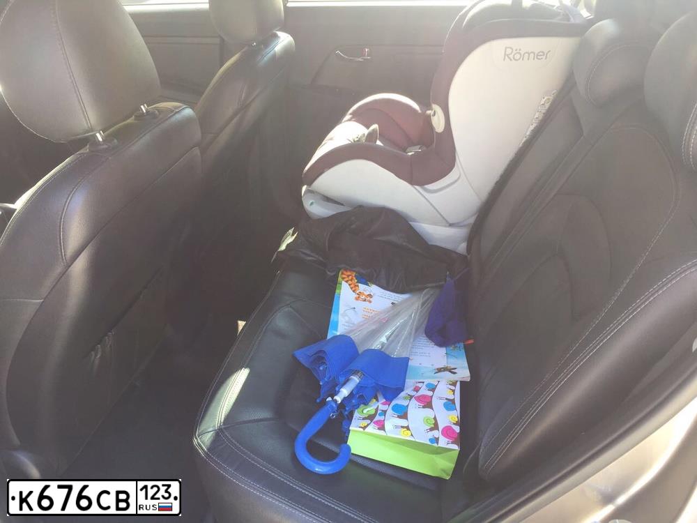 Фото автомобиля KIA SPORTAGE, 2012 — госномер В766ЕТ92. Цвет: Серый