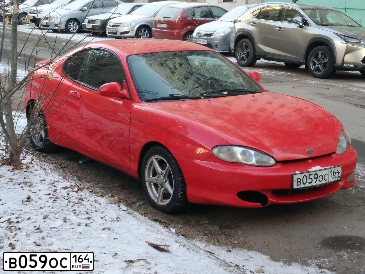 Фото автомобиля HYUNDAI TIBURON, 1997 — госномер В059ОС164. Цвет: Красный