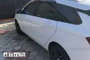 Фото автомобиля LADA VESTA, 2017 — госномер К402КА35. Цвет: БЕЛЫЙ