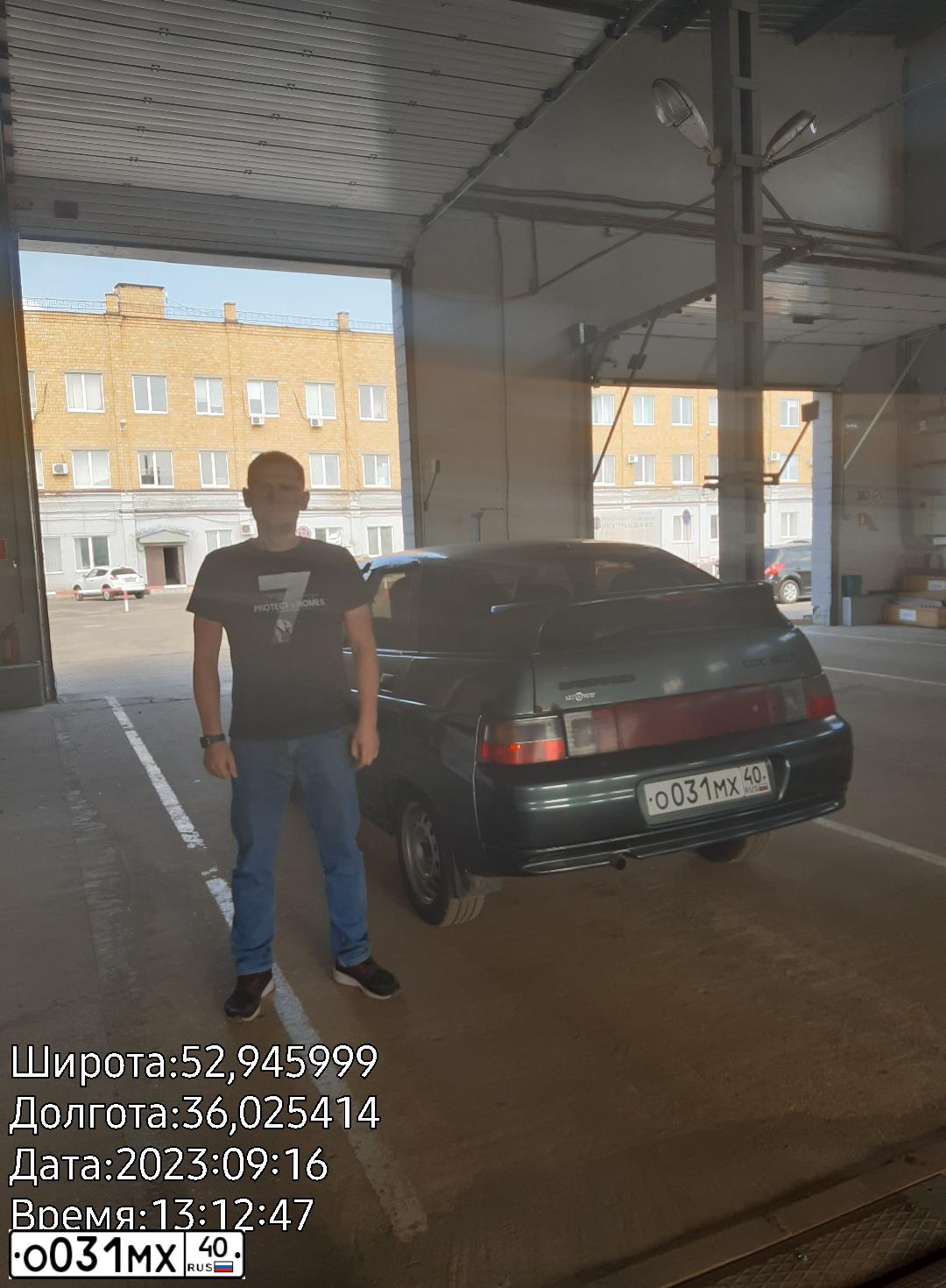 Фото автомобиля LADA 2112, 2007 — госномер Е977ВТ57. Цвет: СЕРО-СИНЕ-ЗЕЛЕНЫЙ