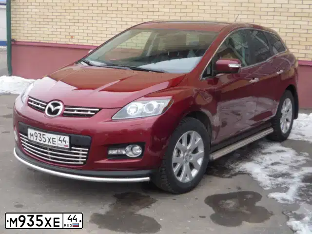 Фото автомобиля MAZDA CX-7, 2008 — госномер М935ХЕ44. Цвет: Красный