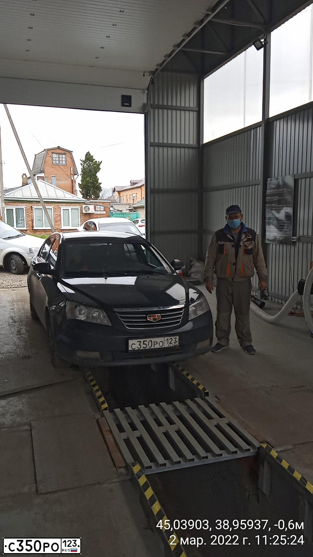 Фото автомобиля GEELY EMGRAND (FE-1), 2014 — госномер Т711АК180. Цвет: ЧЕРНЫЙ