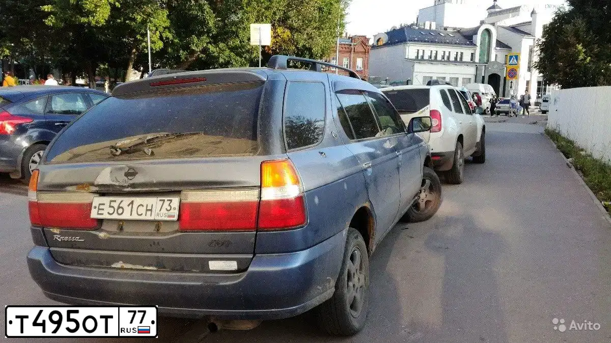 Фото автомобиля KIA RIO, 2013 — госномер Т495ОТ77. Цвет: БЕЛЫЙ