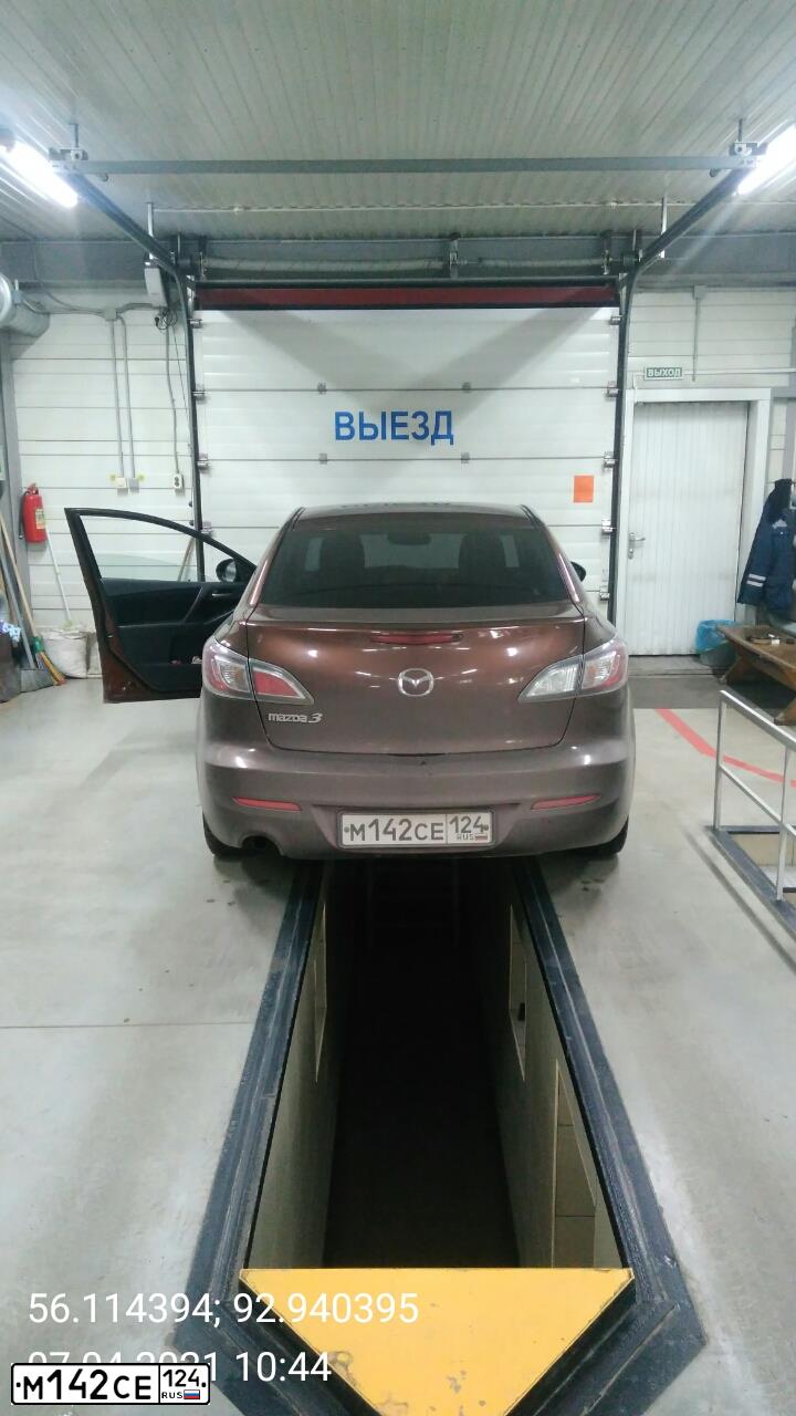 Фото автомобиля MAZDA 3, 2011 — госномер Т162НР124. Цвет: Коричневый