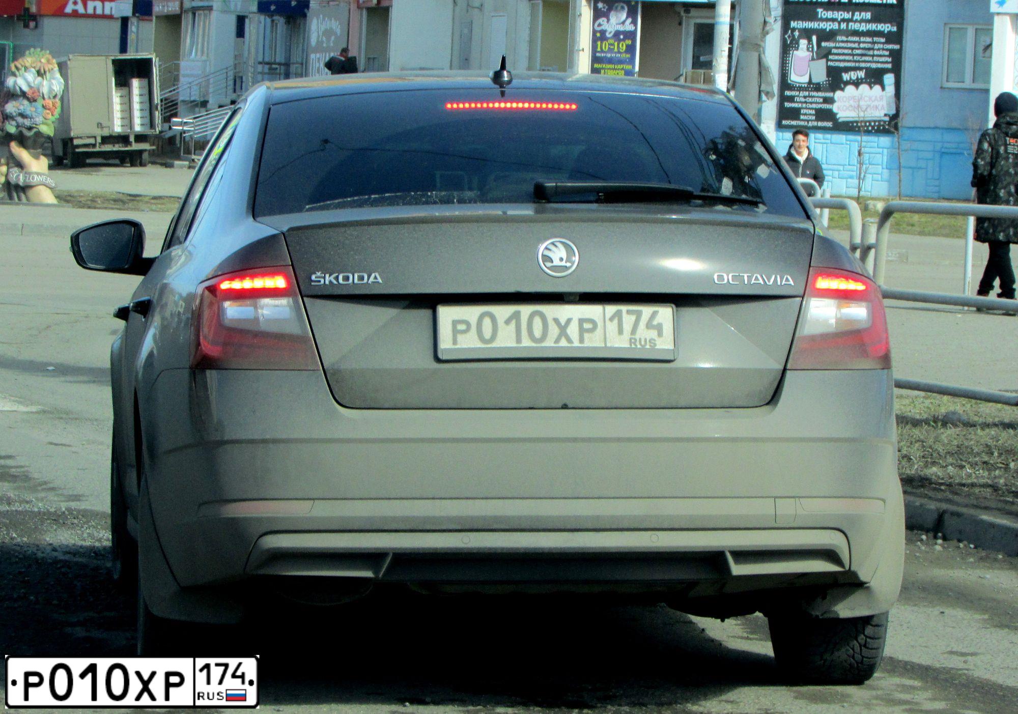 Фото автомобиля SKODA OCTAVIA, 2019 — госномер А164ХК774. Цвет: ЧЕРНЫЙ