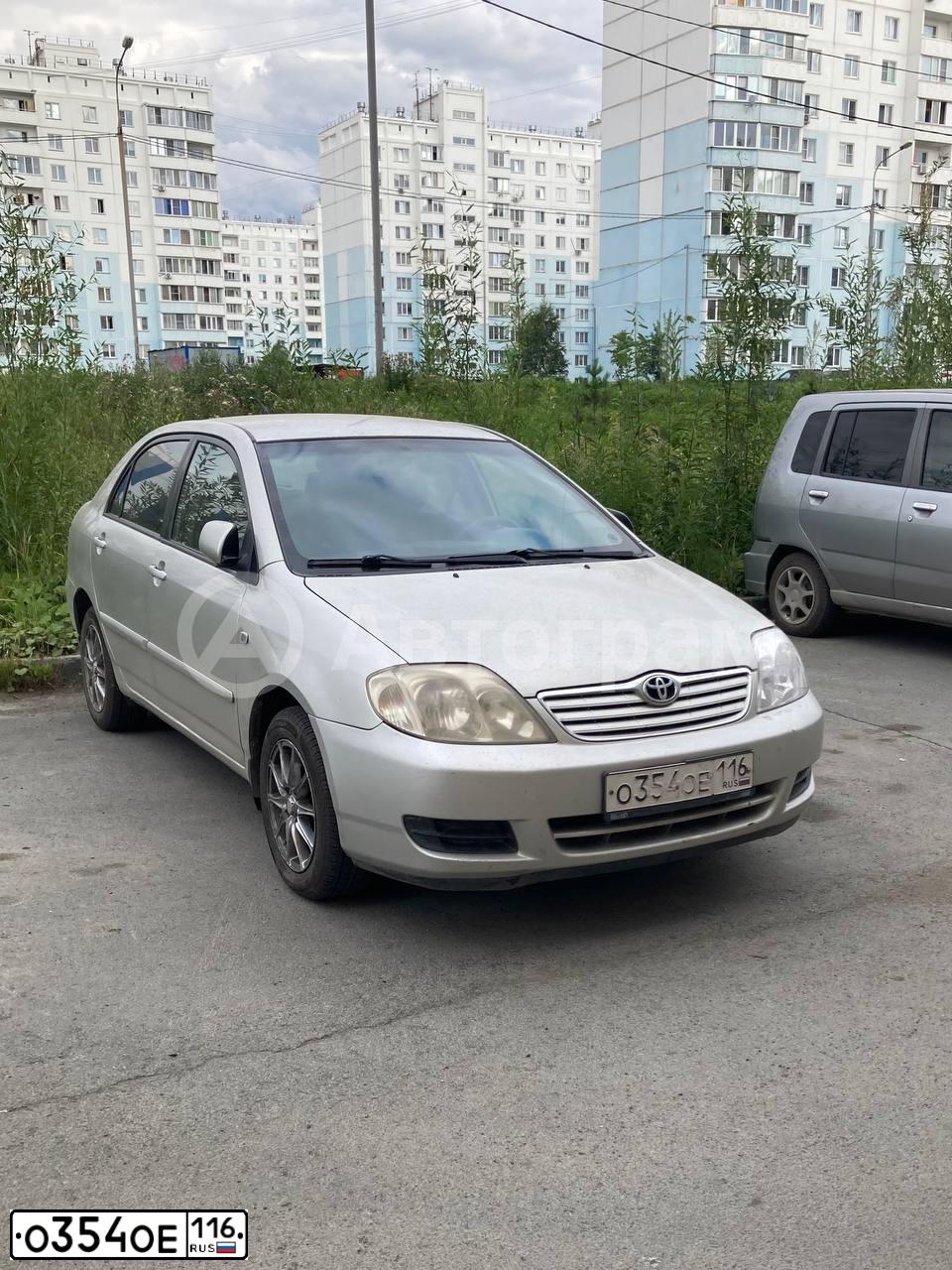 Фото автомобиля TOYOTA COROLLA, 2004 — госномер Р668АУ154. Цвет: СЕРЕБРИСТЫЙ