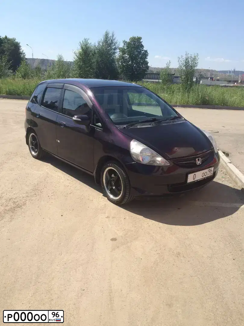 Фото автомобиля FORD FOCUS, 2006 — госномер Н940АТ196. Цвет: ЧЕРНЫЙ