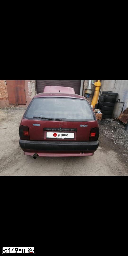 Фото автомобиля ФИАТ TIPO, 1992 — госномер Х646СО55. Цвет: ТЕМНО-КРАСНЫЙ