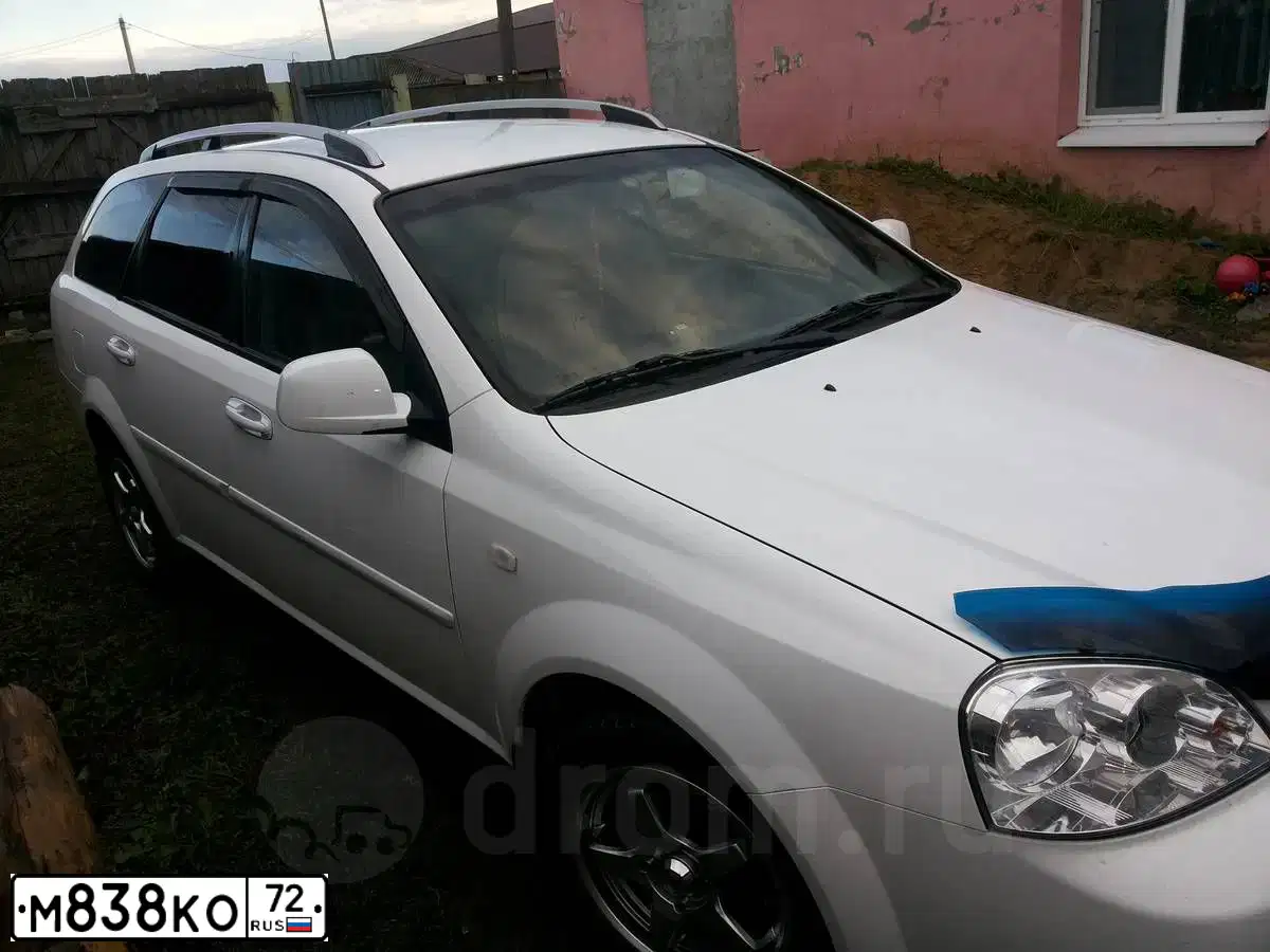 Фото автомобиля CHEVROLET LACETTI, 2012 — госномер М838КО72. Цвет: БЕЛЫЙ