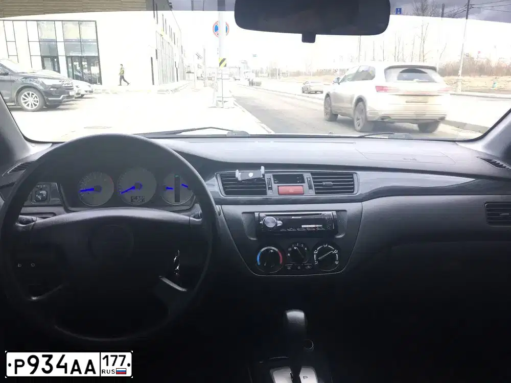 Фото автомобиля MITSUBISHI LANCER, 2005 — госномер О833РУ57. Цвет: Серебристый