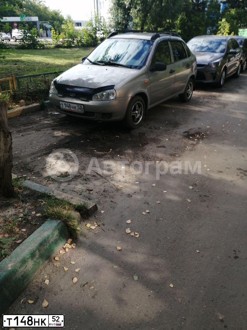 Фото автомобиля LADA 1118 KALINA, 2007 — госномер Т148НК52. Цвет: БЕЖЕВО-СЕРЫЙ