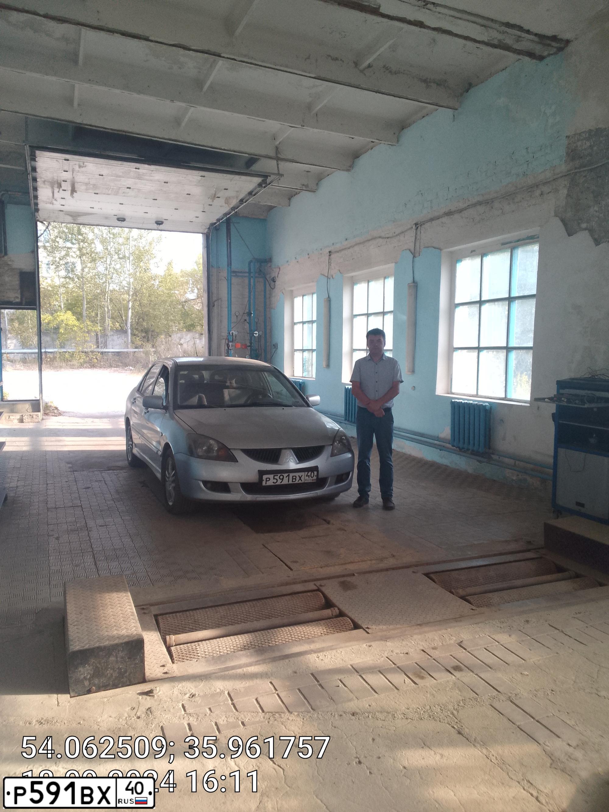 Фото автомобиля MITSUBISHI LANCER, 2005 — госномер Р591ВХ40. Цвет: Серебристый