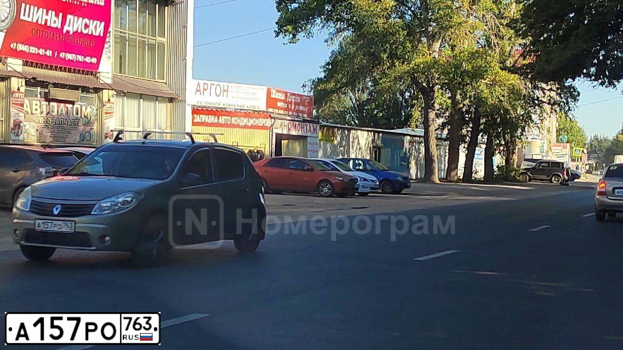 Фото автомобиля RENAULT SANDERO, 2010 — госномер А157РО763. Цвет: БЕЖЕВЫЙ