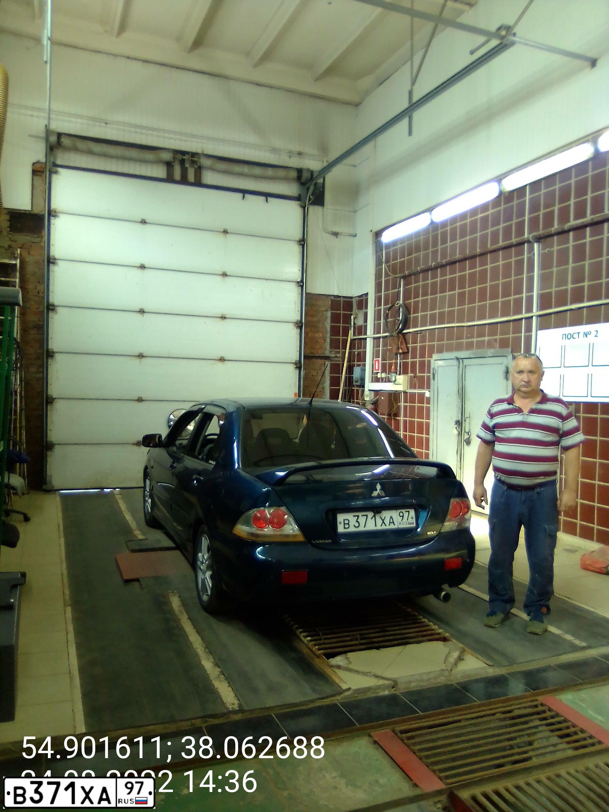 Фото автомобиля MITSUBISHI LANCER, 2005 — госномер В371ХА97. Цвет: синий