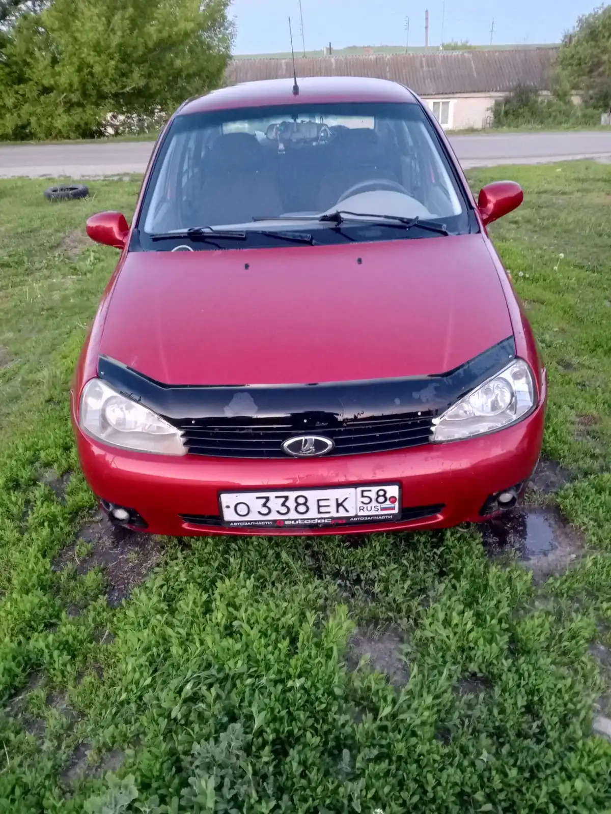 Фото автомобиля LADA 1118 KALINA, 2005 — госномер О338ЕК58. Цвет: СЕРЕБРИСТО-КРАСНЫЙ