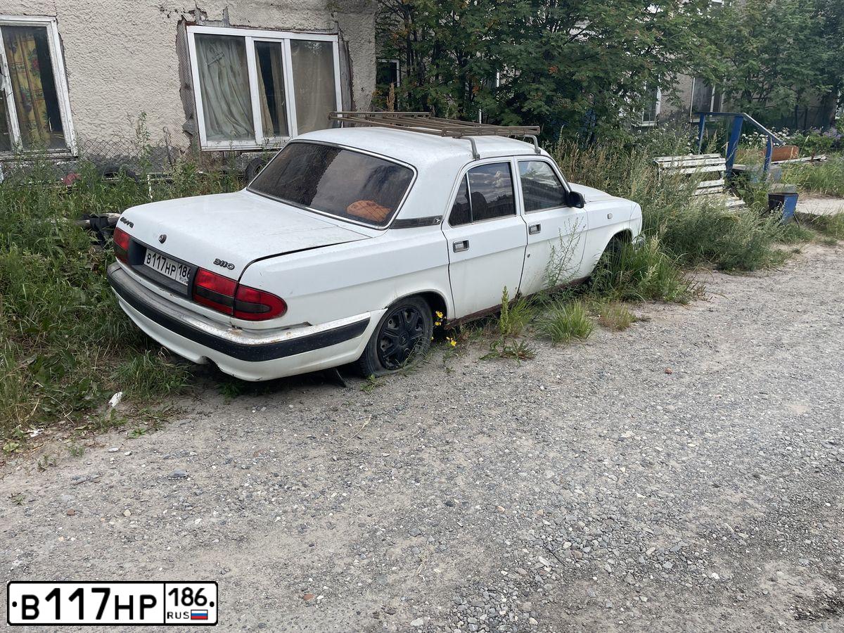 Фото автомобиля GAZ 3110 WOLGA, 2000 — госномер А500ОЕ186. Цвет: Белый