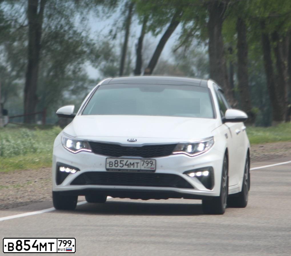 Фото автомобиля KIA MAGENTIS / OPTIMA, 2018 — госномер О229УЕ62. Цвет: БЕЛЫЙ
