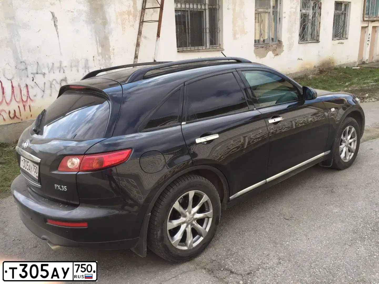 Фото автомобиля CHEVROLET LACETTI, 2005 — госномер М936НВ30. Цвет: Серый