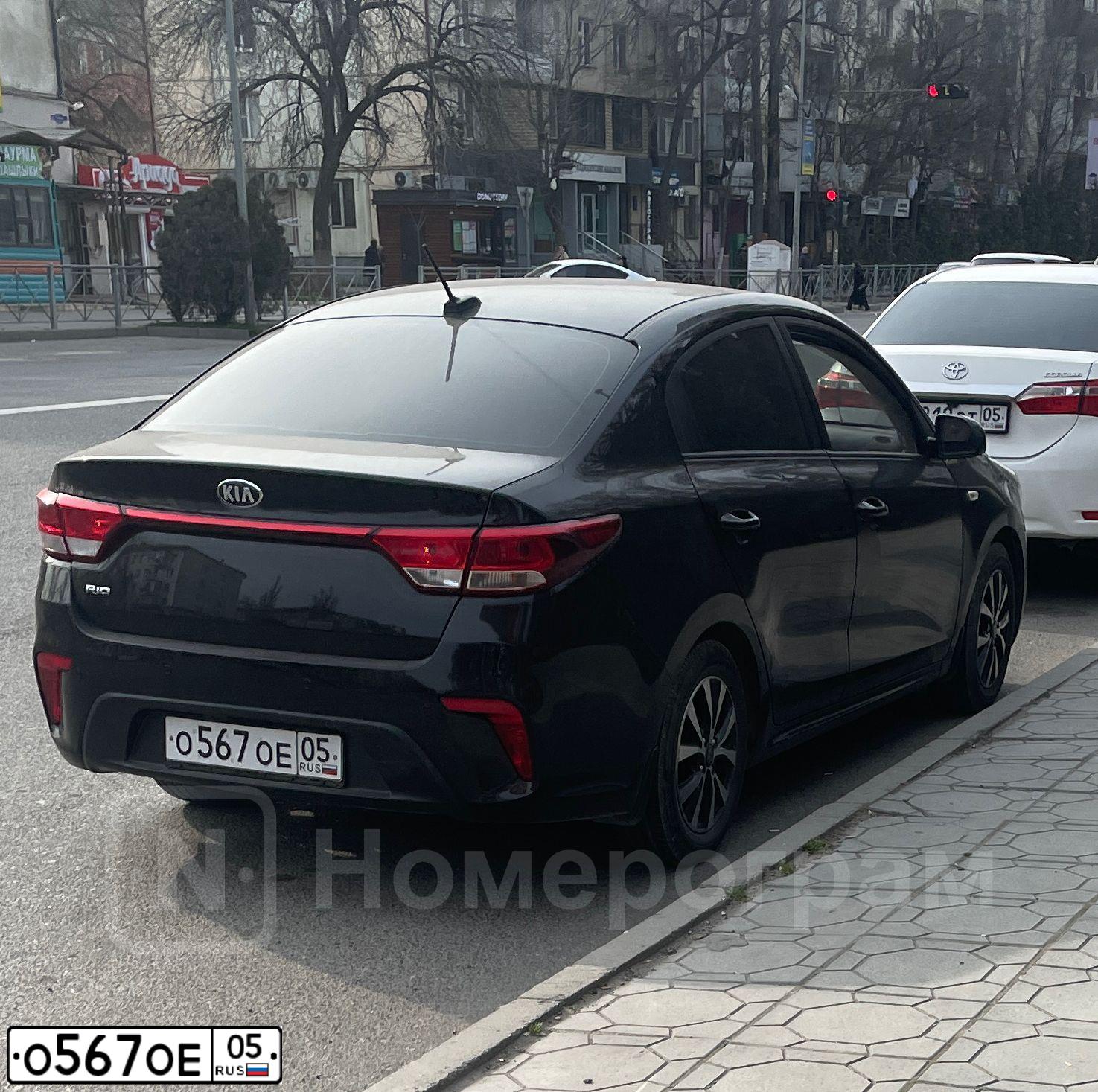 Фото автомобиля KIA RIO, 2017 — госномер О567ОЕ05. Цвет: ЧЕРНЫЙ