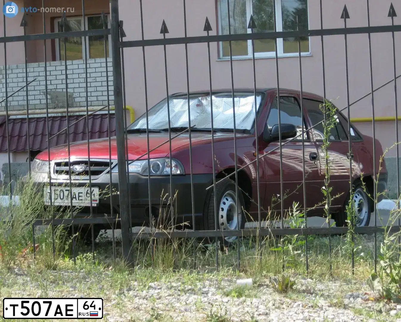 Фото автомобиля DAEWOO NEXIA, 2009 — госномер Р880УВ40. Цвет: ВИШНЕВЫЙ
