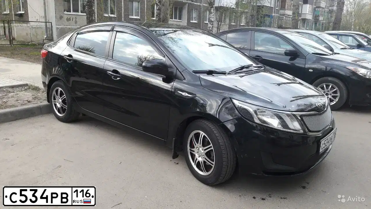 Фото автомобиля KIA RIO, 2013 — госномер С501СХ716. Цвет: ЧЕРНЫЙ