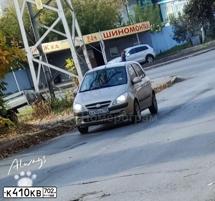Фото автомобиля HYUNDAI GETZ, 2007 — госномер К410КВ702. Цвет: БЕЖЕВЫЙ
