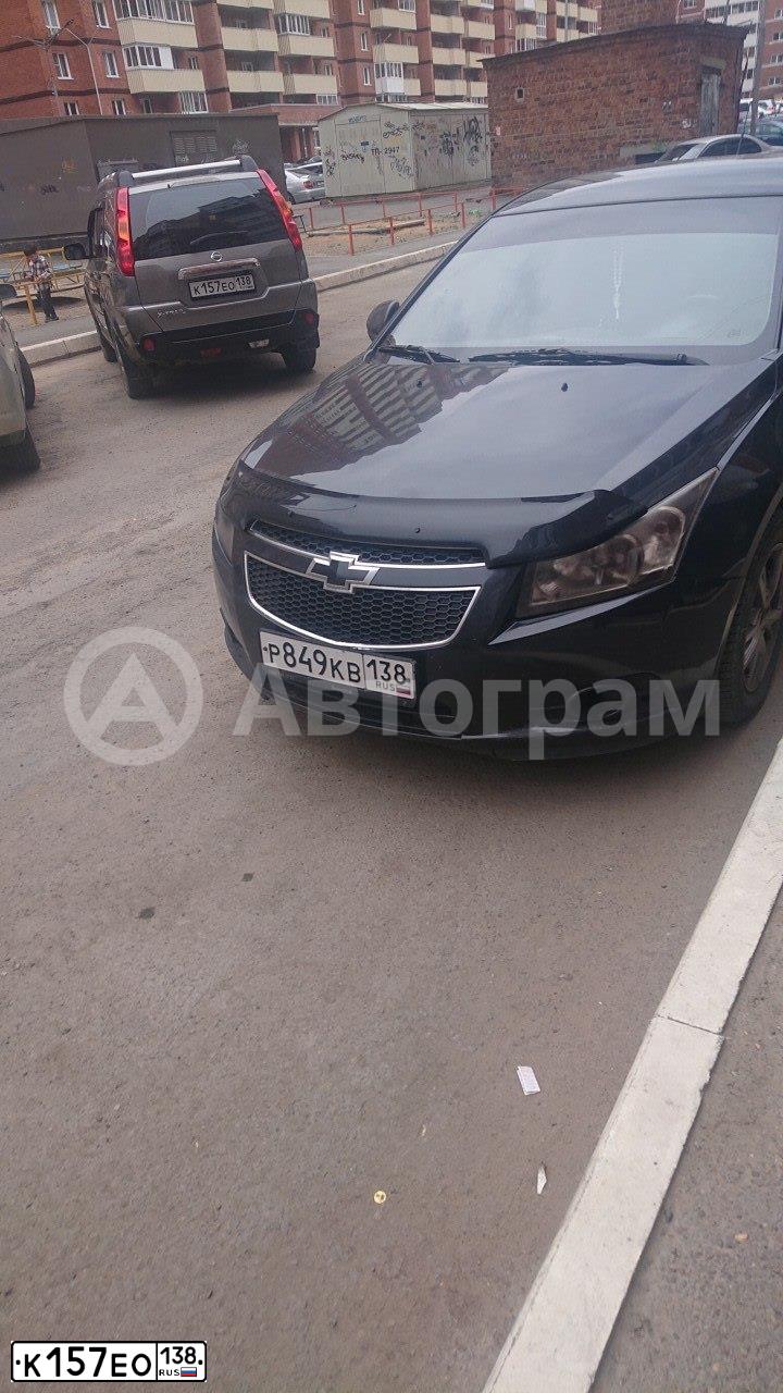 Фото автомобиля NISSAN X-TRAIL, 2007 — госномер К157ЕО138. Цвет: СЕРЫЙ