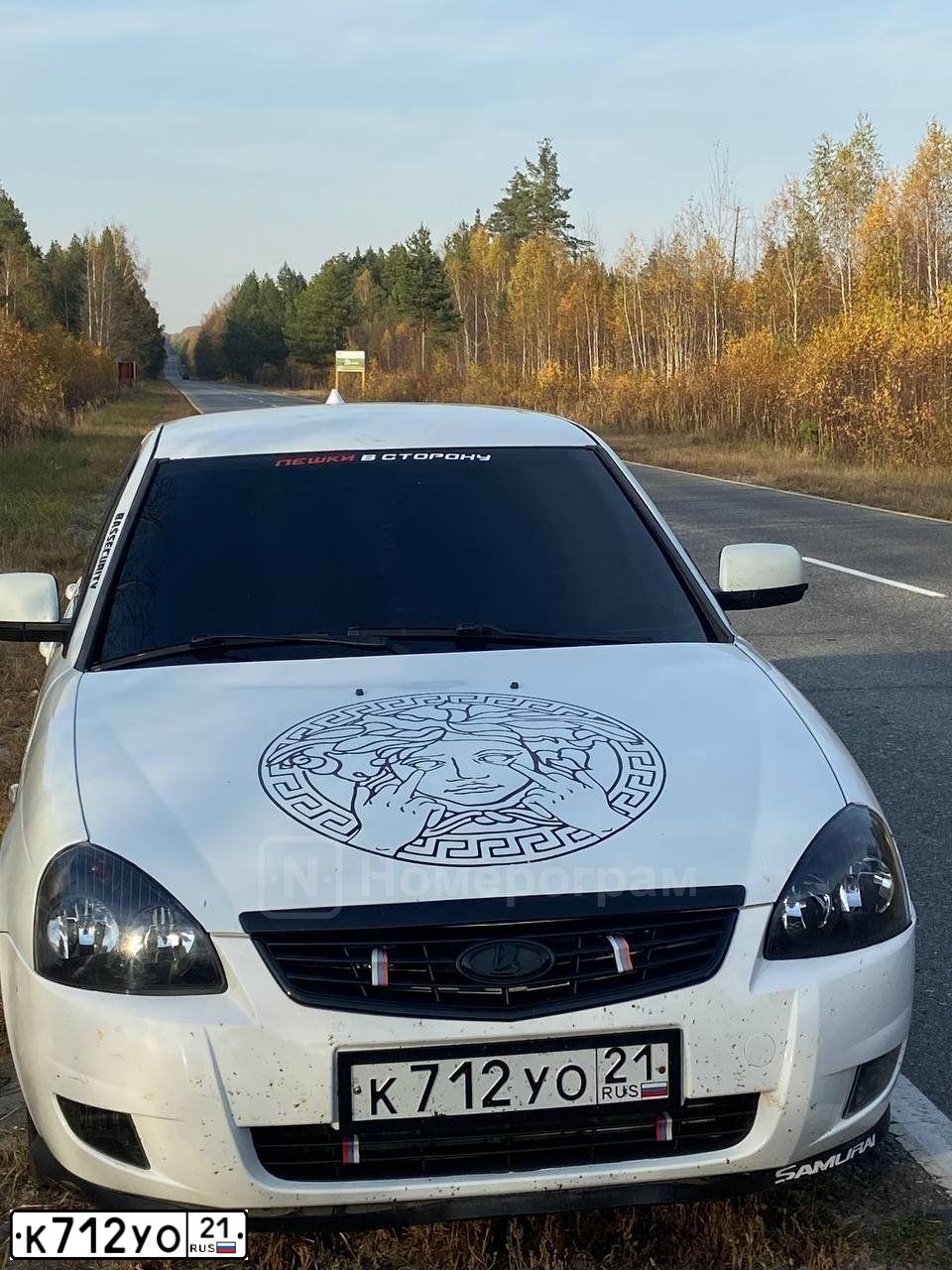 Фото автомобиля LADA 2172 PRIORA, 2009 — госномер К712УО21. Цвет: Белый