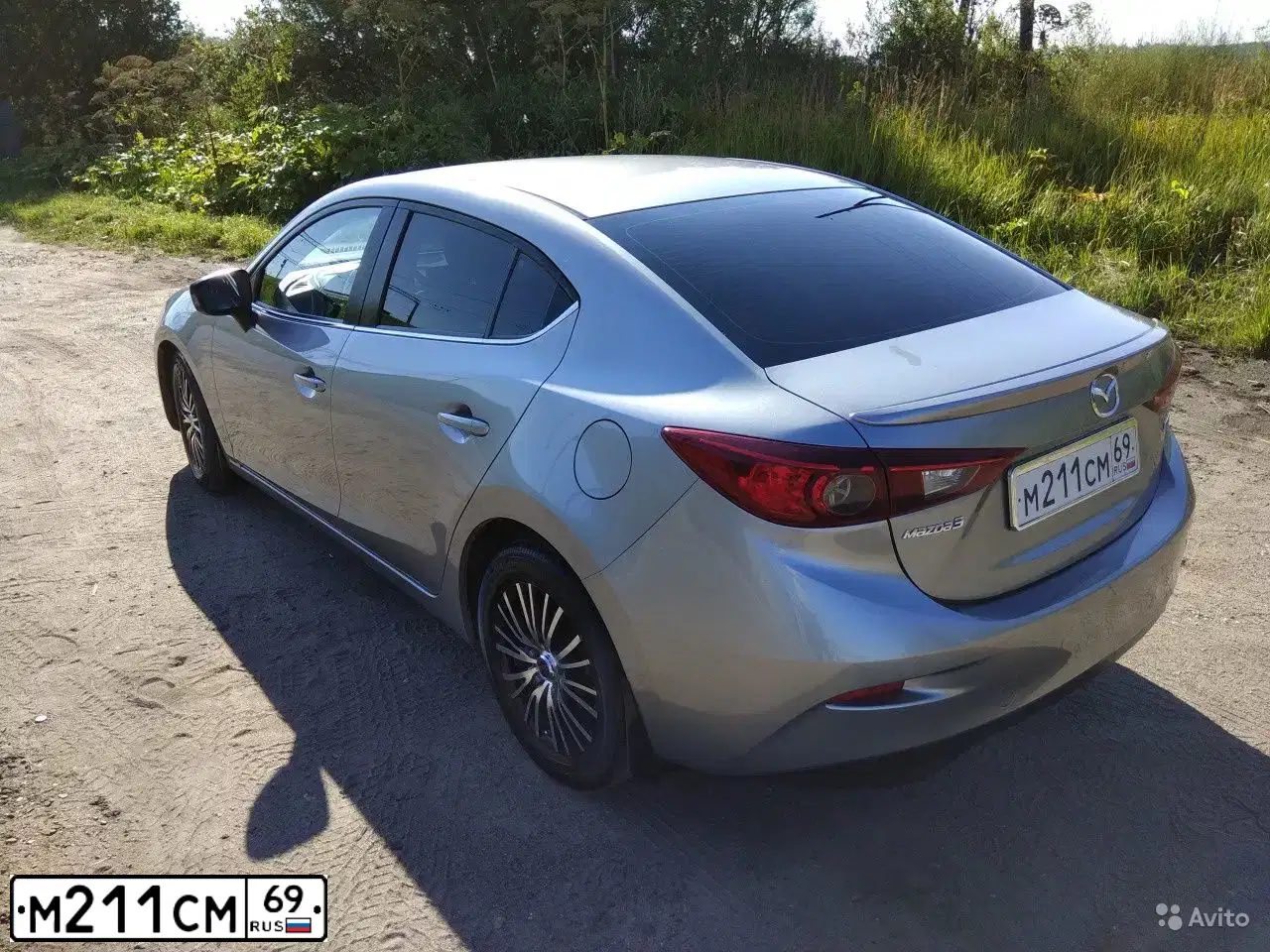 Фото автомобиля MAZDA 3, 2014 — госномер М211СМ69. Цвет: Серебристый