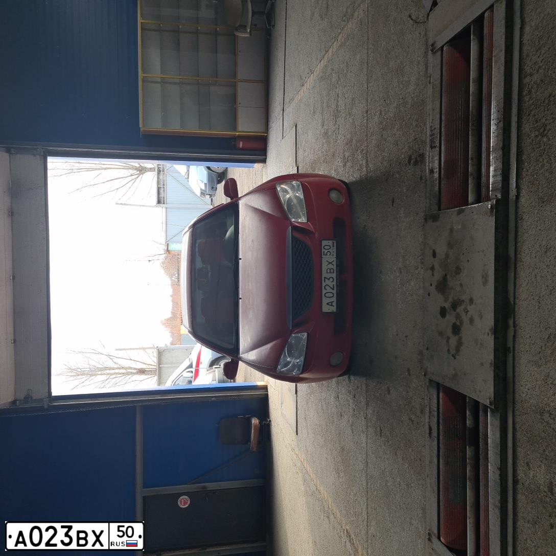 Фото автомобиля KIA CERATO, 2006 — госномер А023ВХ55. Цвет: Красный