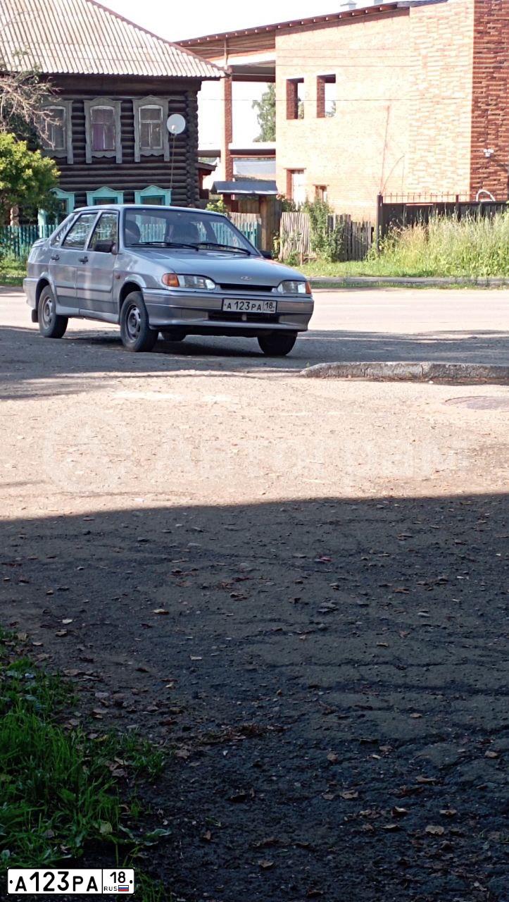 Фото автомобиля LADA 2115 SAMARA, 2009 — госномер А123РА18. Цвет: СВЕТЛО-ГОЛУБОЙ